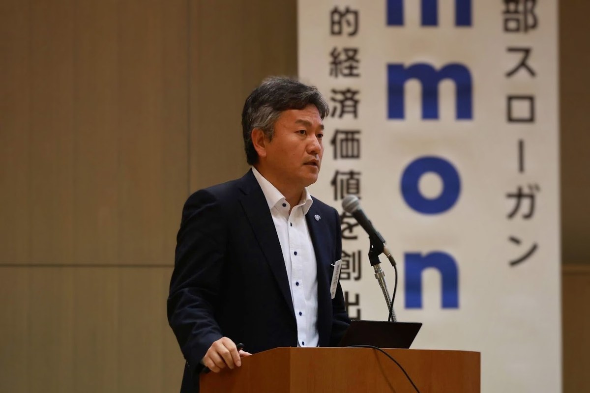 講演する大東正明の写真
